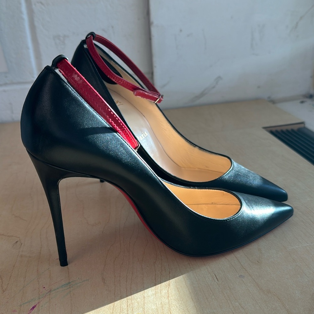 Christian Louboutin red bottom heels. EUC
